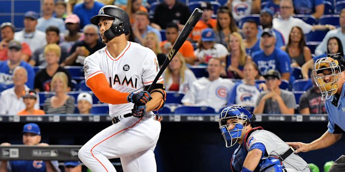 Giancarlo Stanton scored the game's first run on a long ball to center