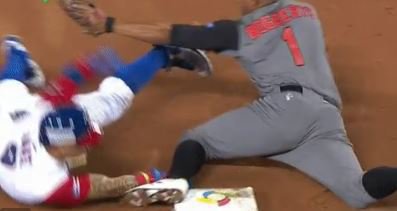 WATCH: Javy Baez does ninja slide in WBC