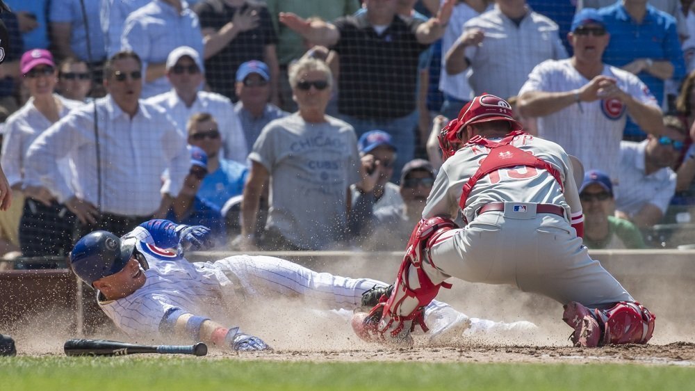Albert Almora, Jr., scored what proved to be the winning run on an overturned call at the plate. (Photo Credit: Patrick Gorski-USA TODAY Sports)