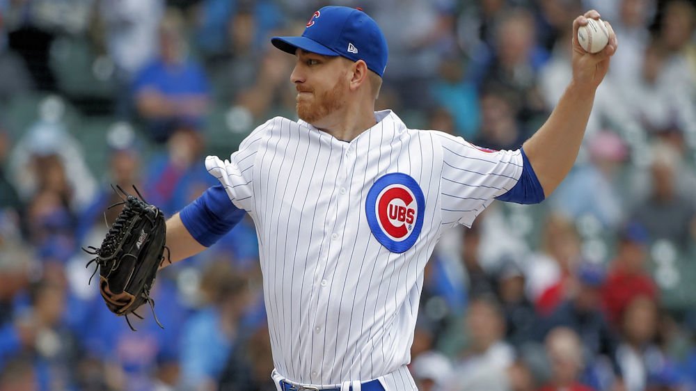 Cubs shut down Pirates, move into first-place tie in division