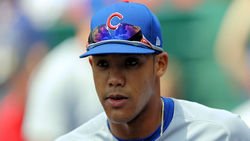 Former Cubs player Addison Russell signs with pro team