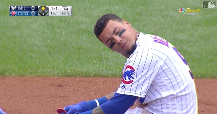 Chicago Cubs shortstop Javier Baez was injured on a hard slide at second base and departed the game several innings later.