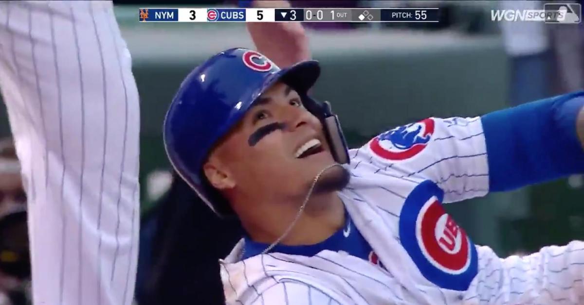 Javier Baez used a characteristic unconventional slide to tab his third triple of the year.