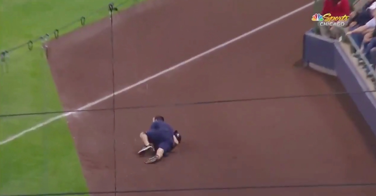 A ball boy at Miller Park gave it his all when laying out in an attempt at catching a line drive hit into foul territory.