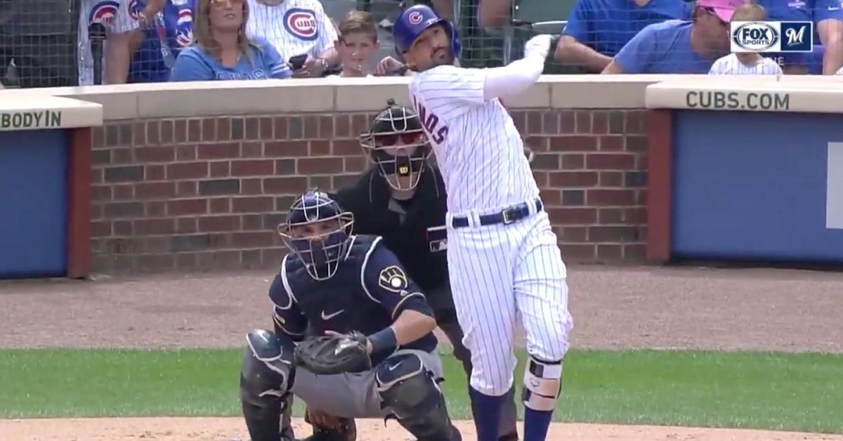 Chicago Cubs right fielder Nicholas Castellanos hit his second 2-run jack of the day and celebrated by slamming his bat down.