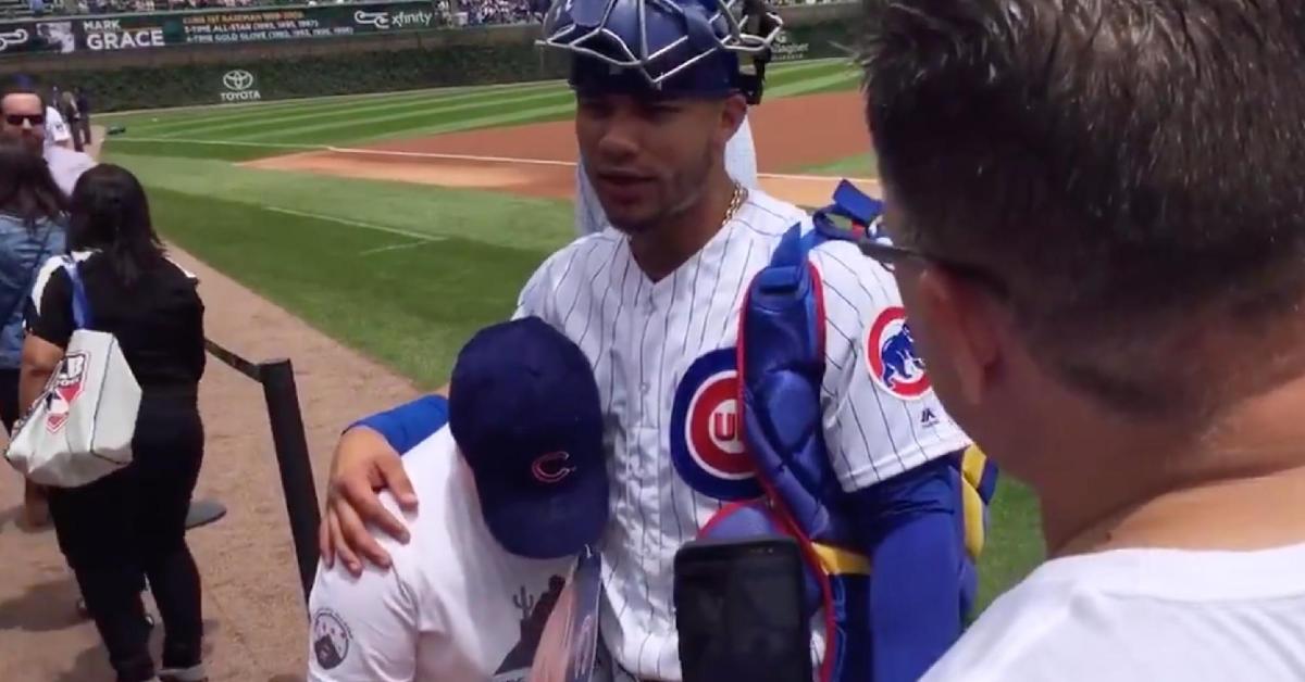 Willson Contreras shared a touching moment with a young fan prior to Friday's game.