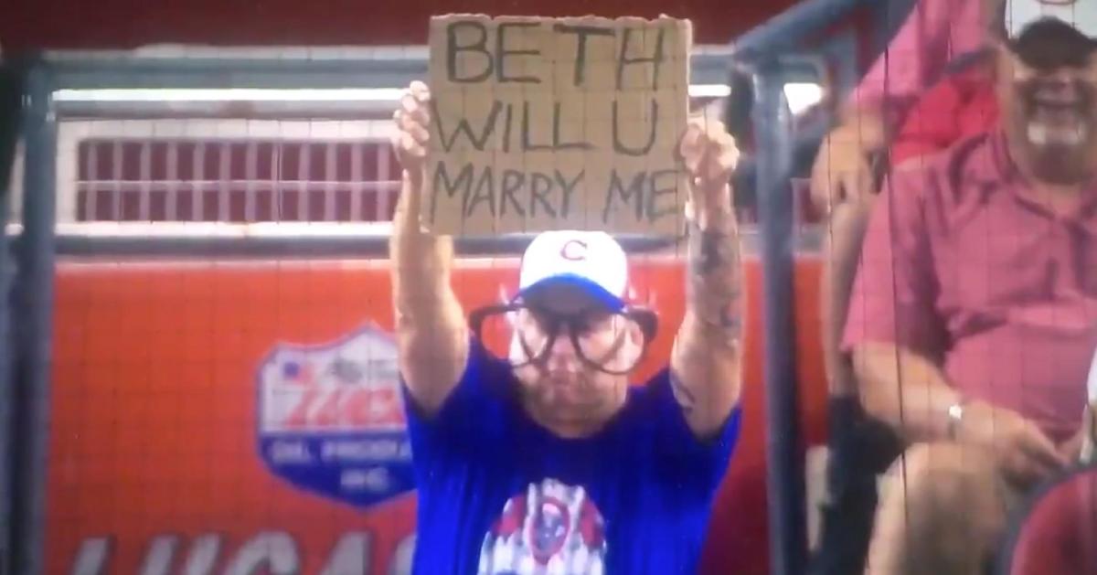 A drunk Cubs fan by the name of Jeremy asked an unlucky lady by the name of Beth to become his bride-to-be.