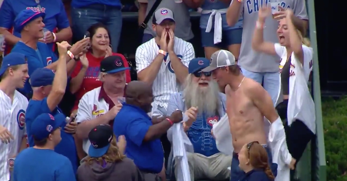 A disloyal St. Louis fan discarded his Cardinals jersey for a Cubs jersey after catching a home run hit by a Cubs player at Wrigley Field.