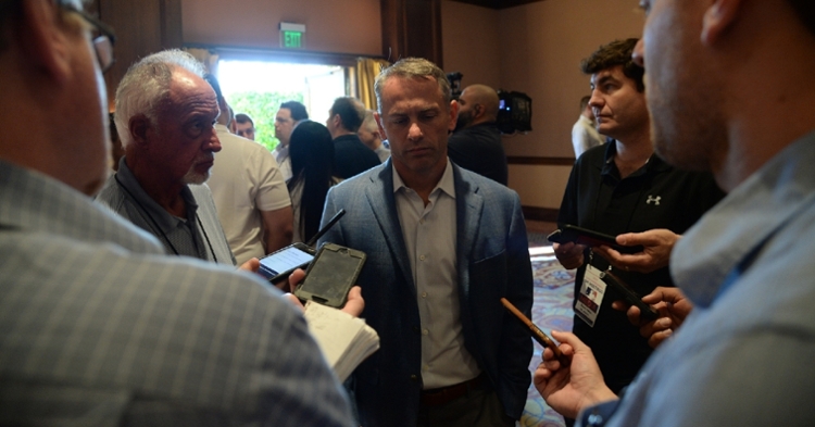 Jed Hoyer with reporters at the GM Meetings (Joe Camporeale - USA Today Sports)