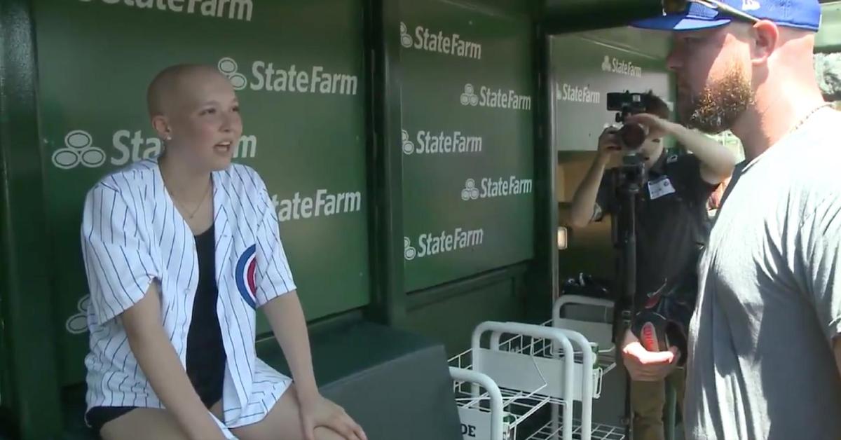 Jon Lester talked with Ashlyn Clark, who is courageously fighting cancer, at Wrigley Field on Wednesday.