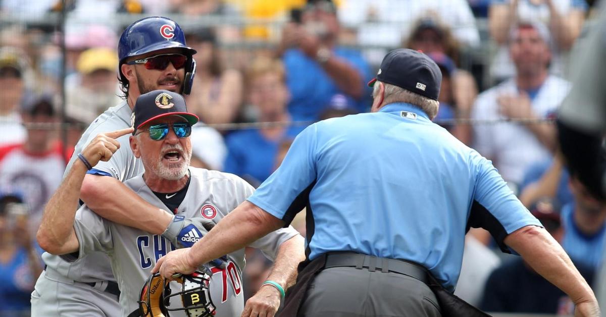 Kris Bryant had to restrain Joe Maddon, who attempted to confront Clint Hurdle over the excessive high, inside pitches. (Credit: Charles LeClaire-USA TODAY Sports)