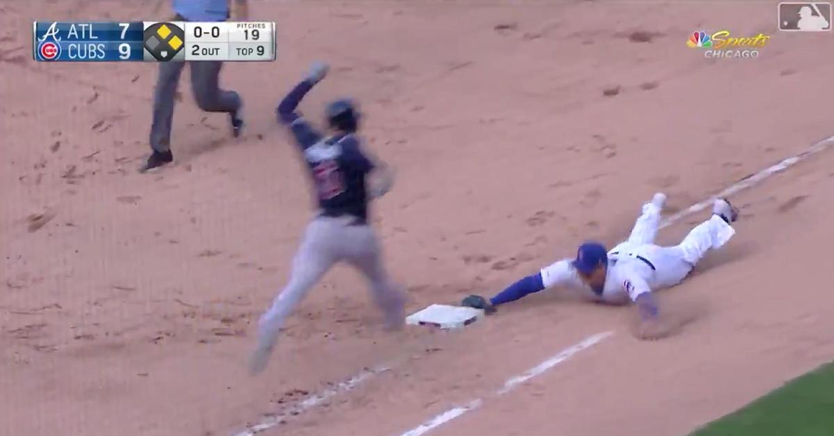 Anthony Rizzo laid out in order to collect the game-winning out at first base.