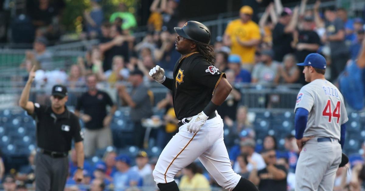 Josh Bell dominated Cubs pitching by going yard three times on the night. (Credit: Charles LeClaire-USA TODAY Sports)