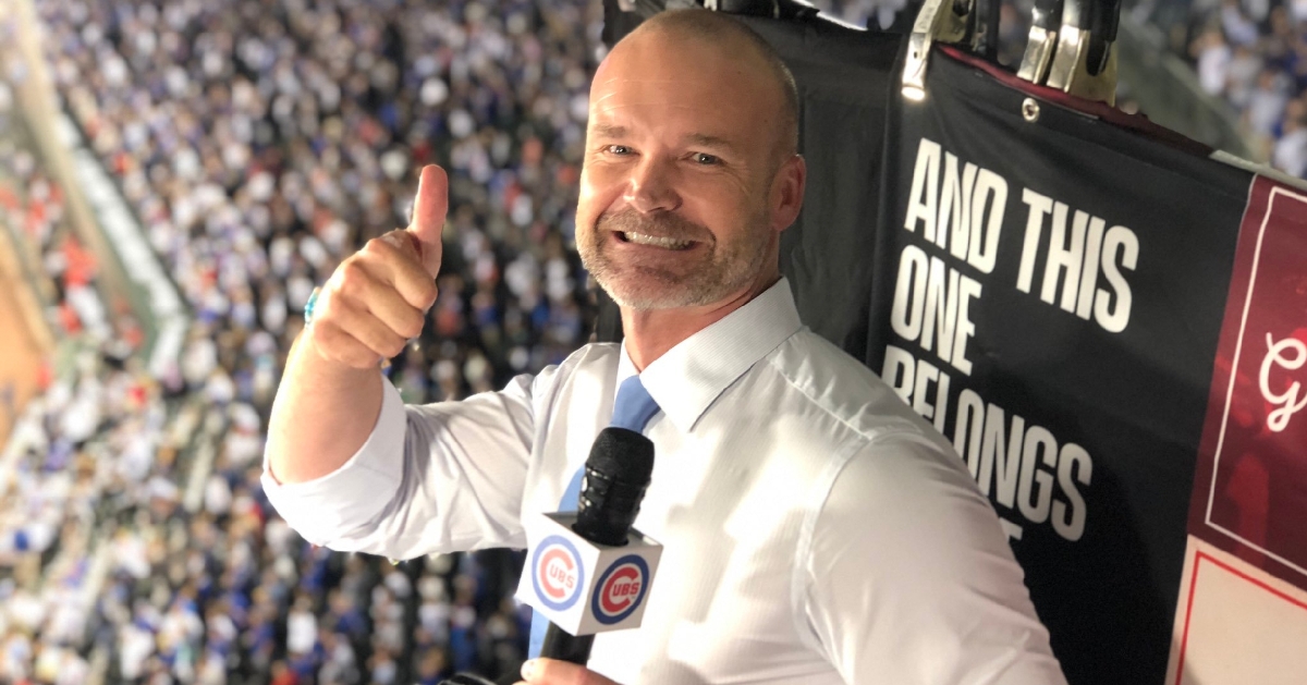 Former Chicago Cubs catcher David Ross sang out the seventh-inning stretch at Wrigley Field on Tuesday. (Credit: @Cubs on Twitter)