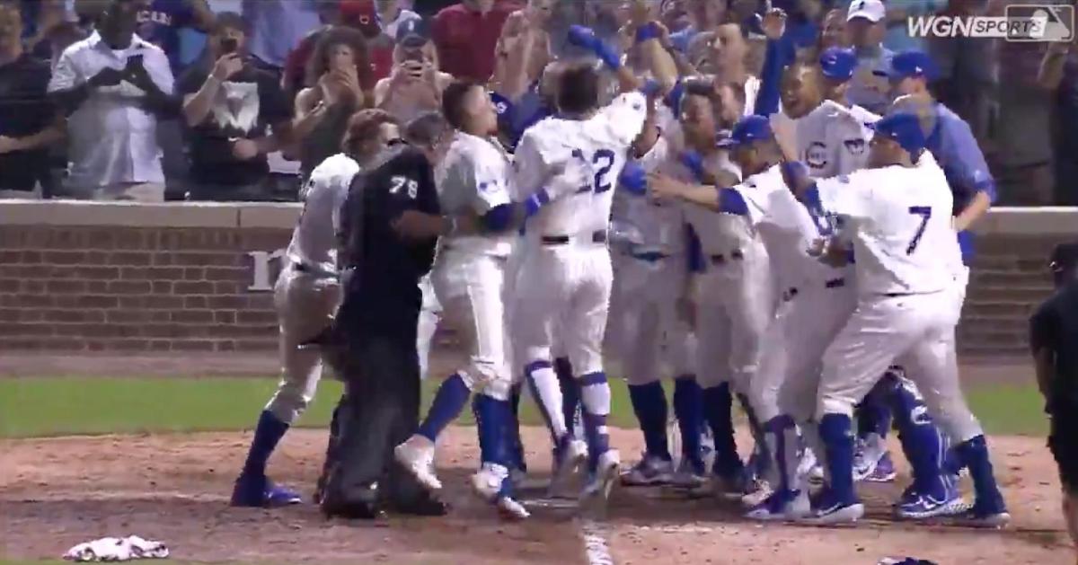 Kyle Schwarber was mobbed at the plate by his teammates after drilling a walkoff home run.