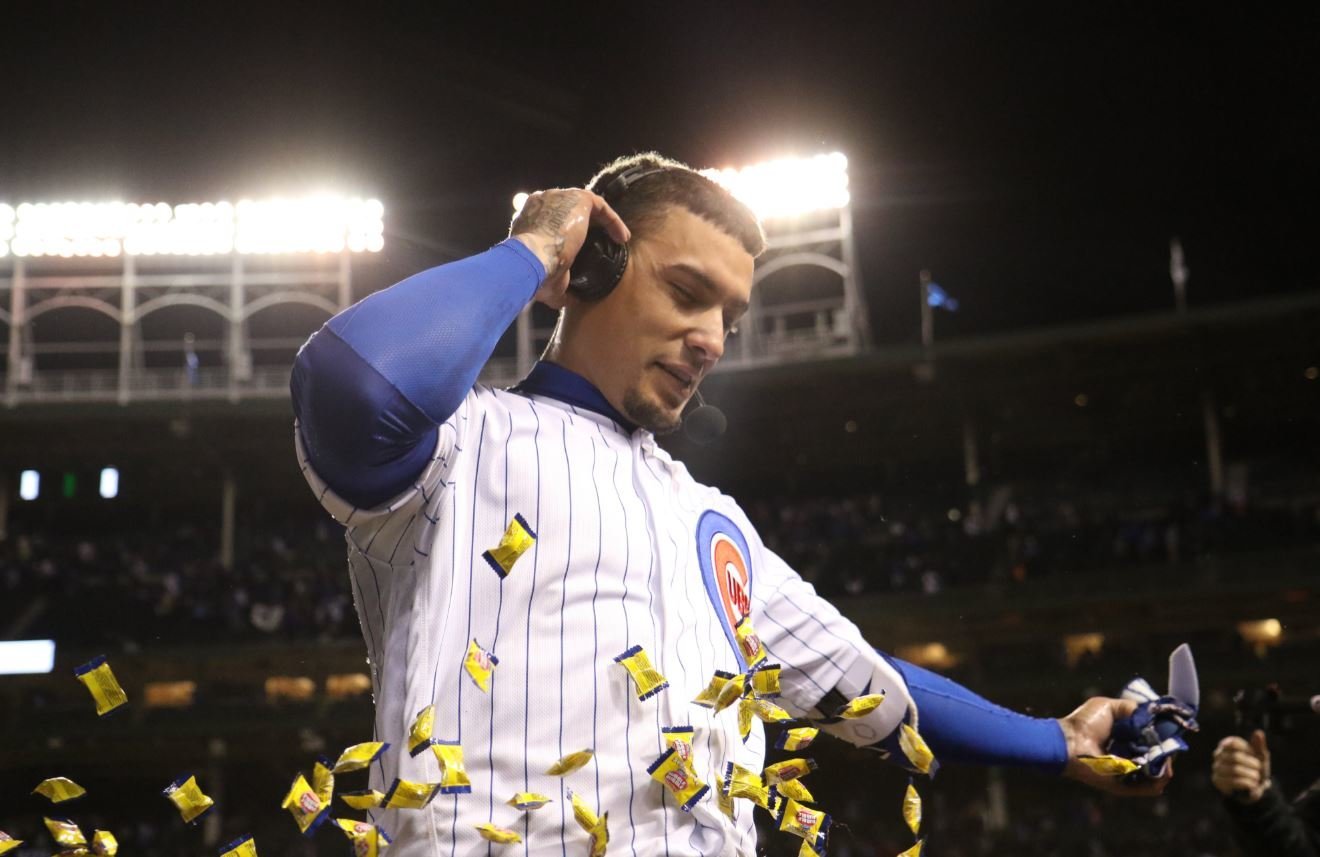 A noted gum connoisseur, Javier Baez did not seem to mind being bathed in his favorite sweet treat. (Credit: Patrick Gorski-USA TODAY Sports)