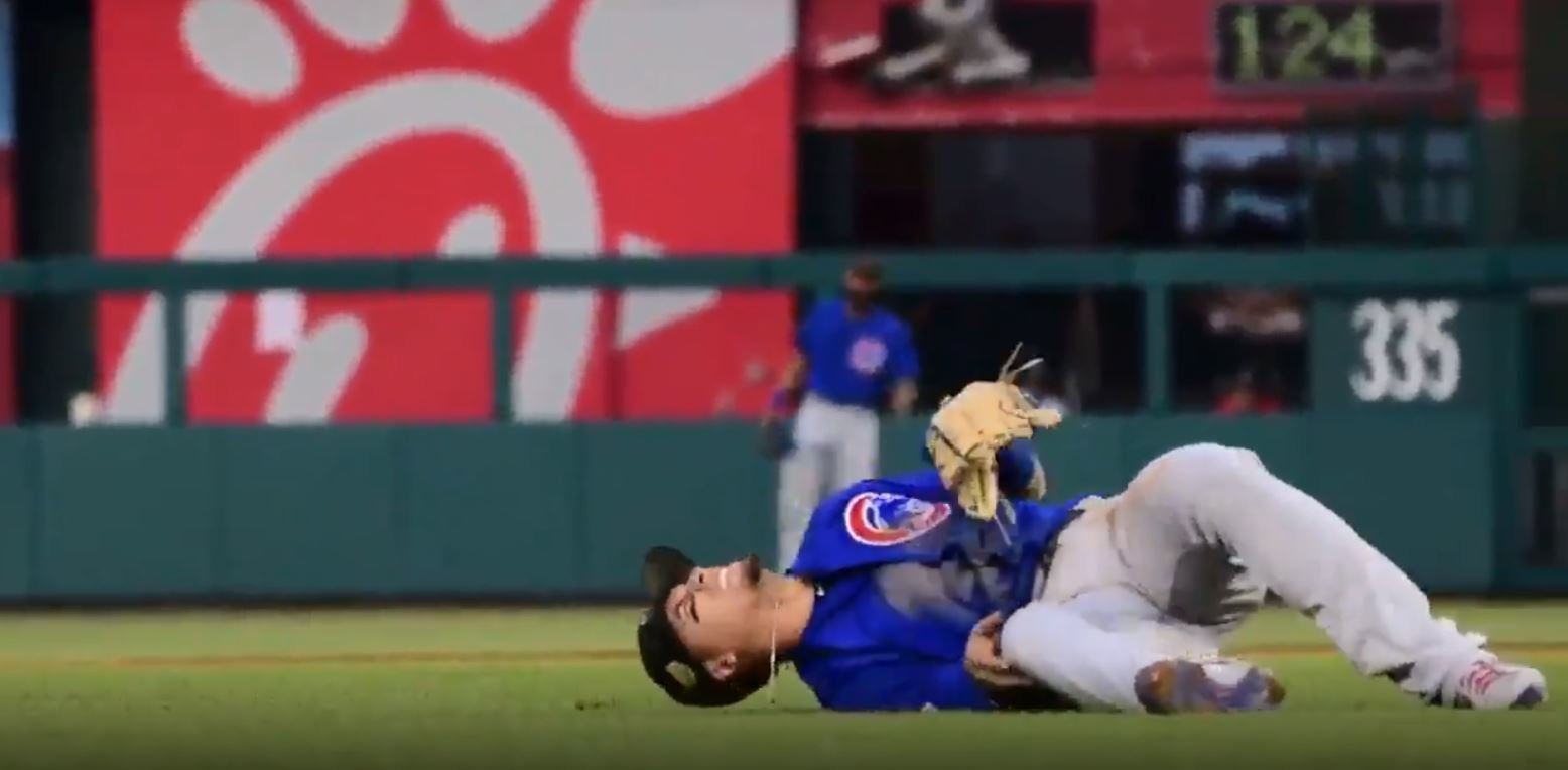 Chicago Cubs shortstop Javier Baez was injured while making a stellar defensive play. (Credit: Kamil Krzazcysnki-USA TODAY Sports)