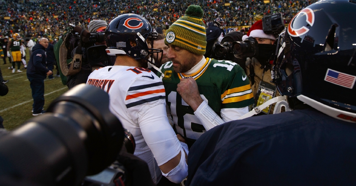 Postgame handshakes with the two quarterbacks (Jeff Hanisch - USA Today Sports)