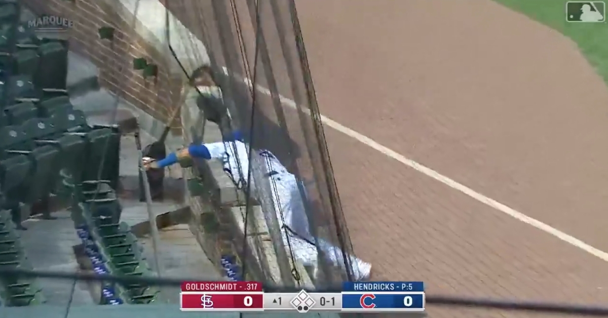 Javier Baez snagged a foulout while leaning into the protective netting on the left field side of Wrigley Field.