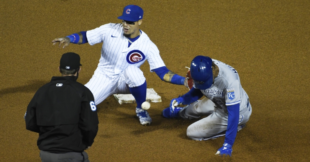 Baez with the no-look tag to get the out (David Banks - USA Today Sports)