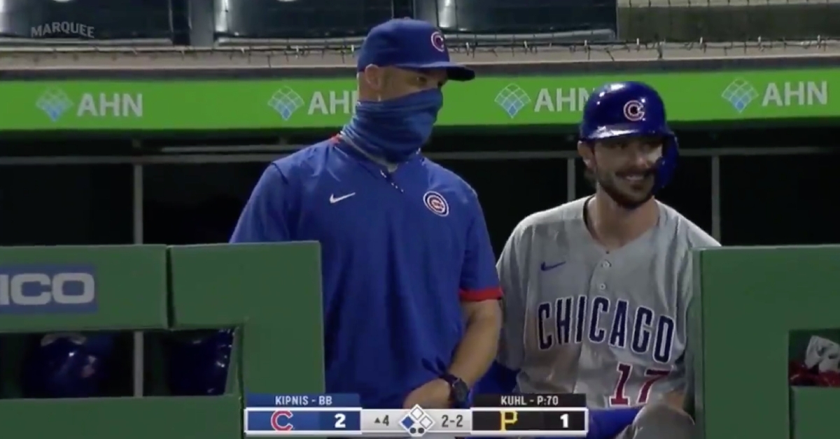 Kris Bryant could not help but laugh at David Ross' fiery exchange with an umpire.