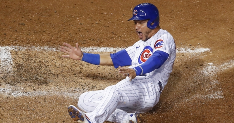 Just for the fun of it, Willson Contreras slid across the plate upon reaching home with ease on a Jason Heyward triple. (Credit: Kamil Krzaczynski-USA TODAY Sports)