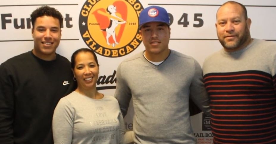 Hernandez with his family during his signing 
