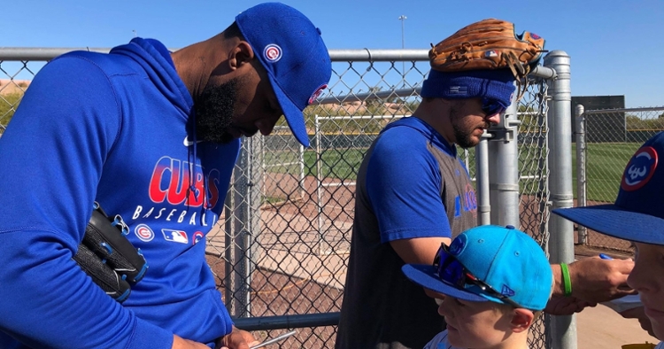 Heyward and Schwarber signed autographs for the fans on Wednesday
