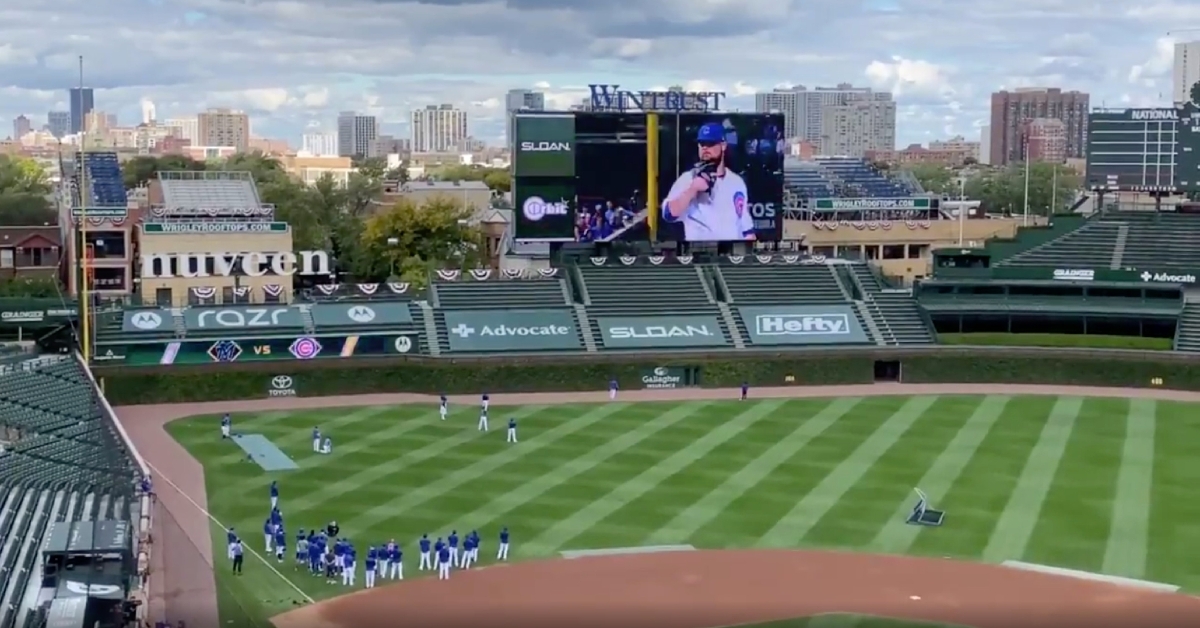 A Jon Lester tribute video narrated by Kyle Schwarber played on the Wrigley Field video board at a Cubs practice.