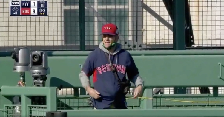 A fan somehow managed to sneak into Fenway Park in the midst of a game on Sunday afternoon.