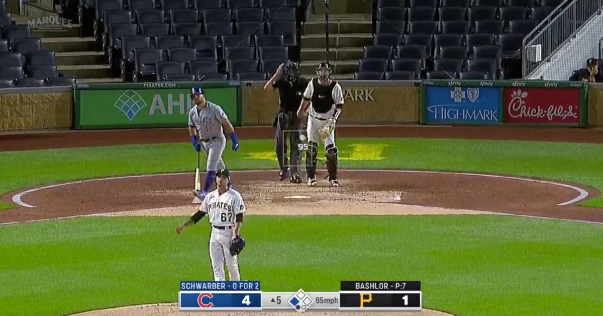 Cubs slugger Kyle Schwarber ogled his mammoth home run before heading to first base.