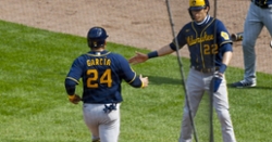 Brewers outlast Cubs in extra-inning affair