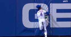 WATCH: Albert Almora Jr. crashes face-first into outfield wall