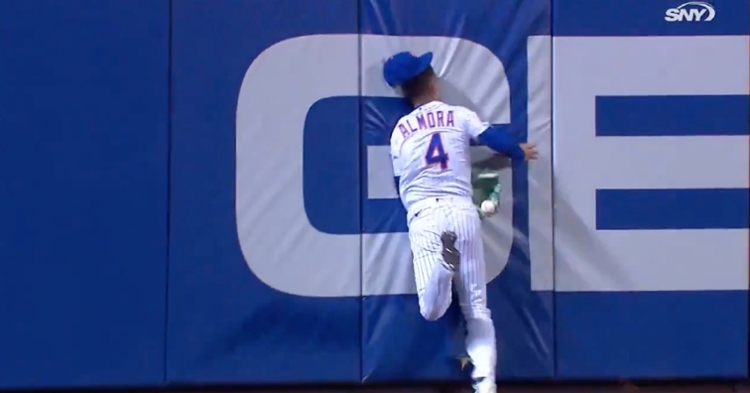 Albert Almora Jr. was forced to exit the game after colliding with the outfield wall.