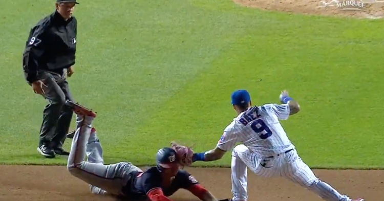 Javier Baez's no-look tag provided Willson Contreras with his fourth caught stealing of the season.