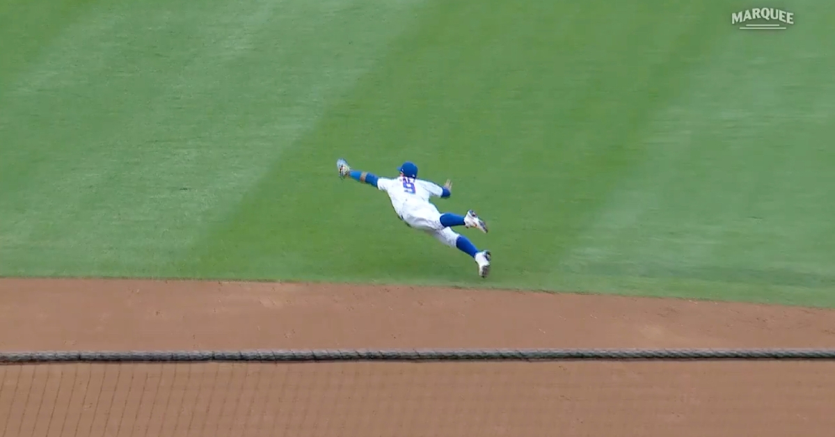 Going airborne, Javier "El Mago" Baez went all out in pulling off a breathtaking defensive feat.