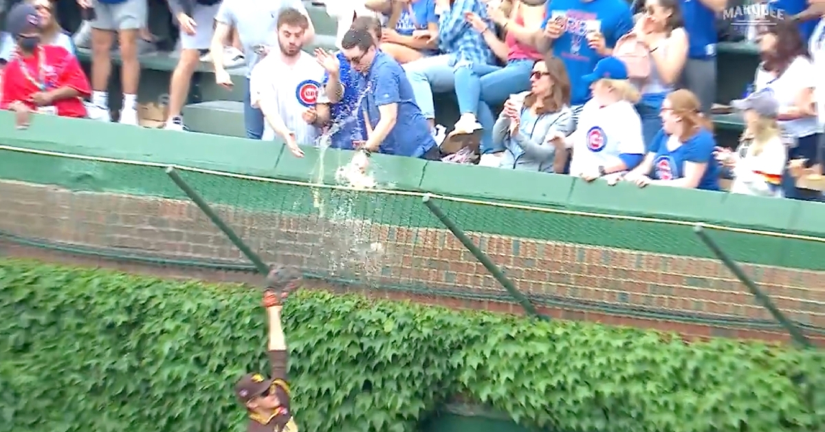 Was this fan planning to continue drinking the beer after a baseball landed in it? The world may never know.