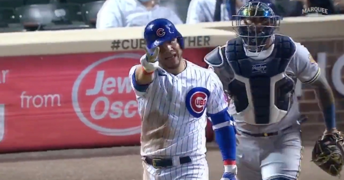 Willson Contreras held up two fingers to indicate how many times he had been hit two games into the series.
