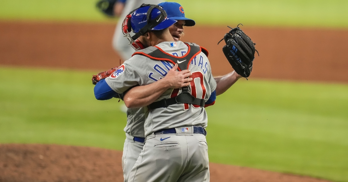 Contreras embraces Kimbrel after the win (Dale Zanine - USA Today Sports)