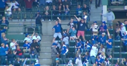 WATCH: Cubs fan holding beer makes one-handed catch of foul ball