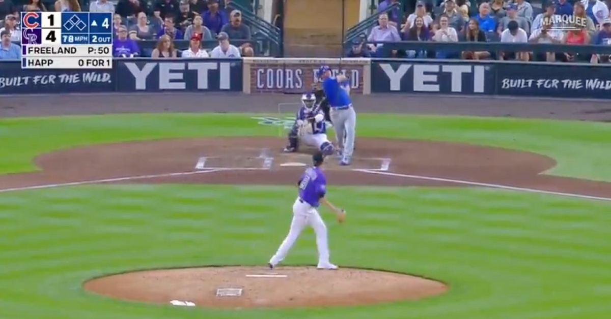 Batting at elevation, Cubs left fielder Ian Happ elevated a curveball for a home run at Coors Field.