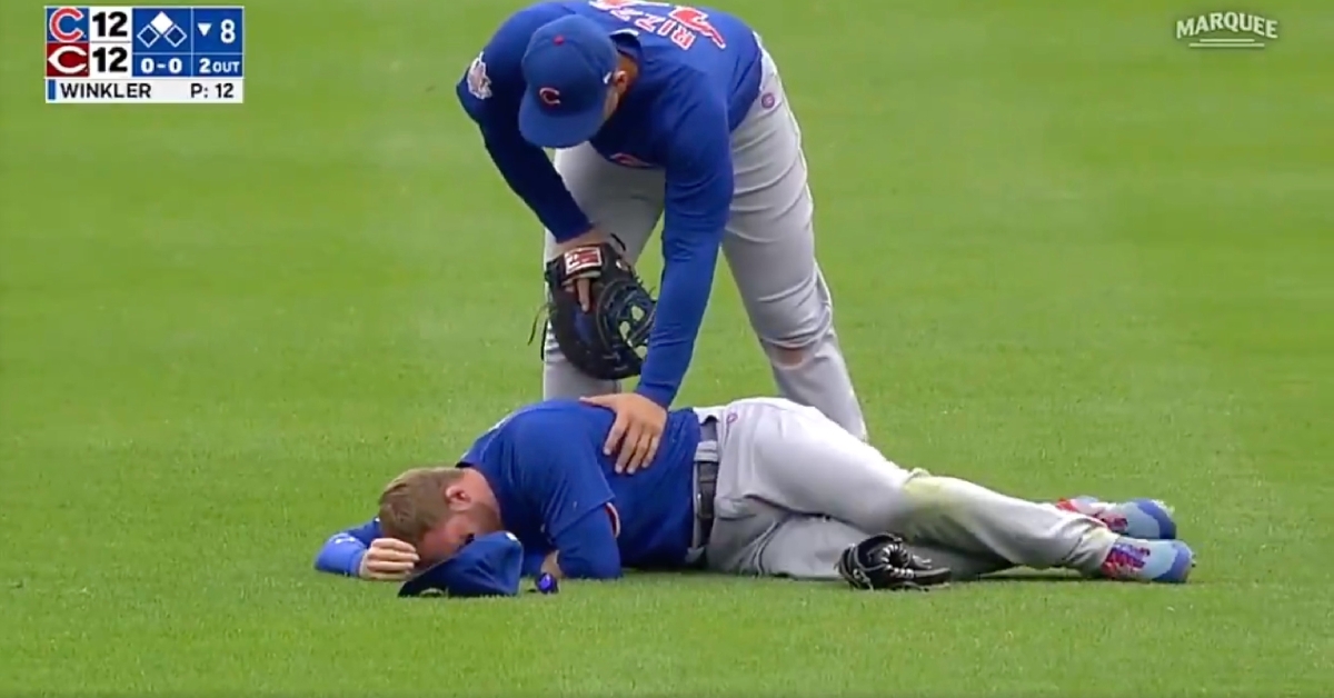 In a cruel turn of events, Ian Happ was forced to exit Sunday's game in the half-inning that followed his game-tying home run.