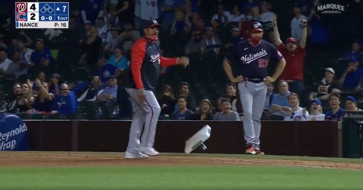 Much to the approval of onlooking Cubs fans, Dave Martinez spiked the first-base bag into the ground and then kicked it.