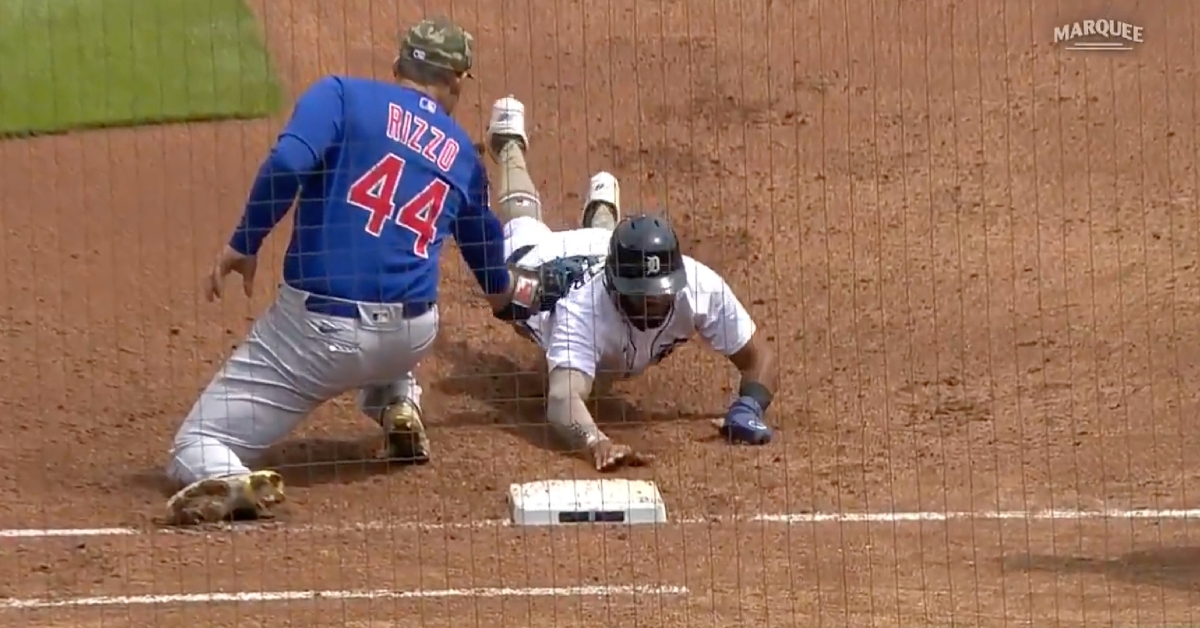 Anthony Rizzo completed a pickoff at first base by tagging out Willi Castro as he dived back toward the bag.