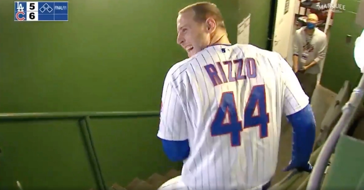 Anthony Rizzo did not wait around to be pounced on and doused in water by his rowdy teammates.