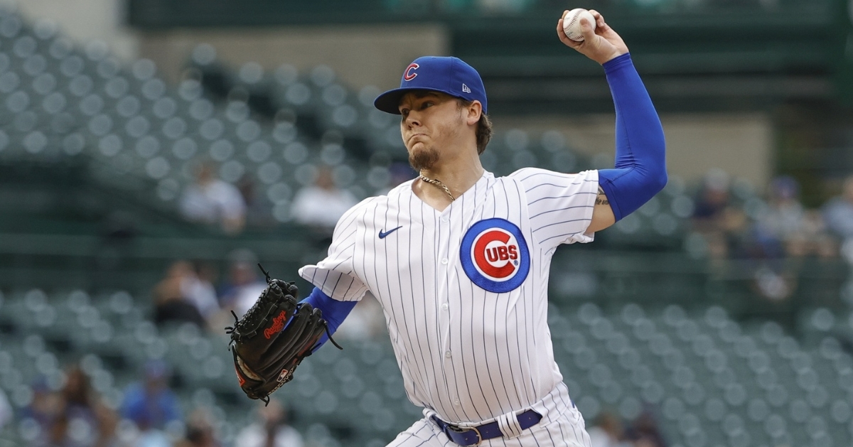 Cubs lose slugfest in extras