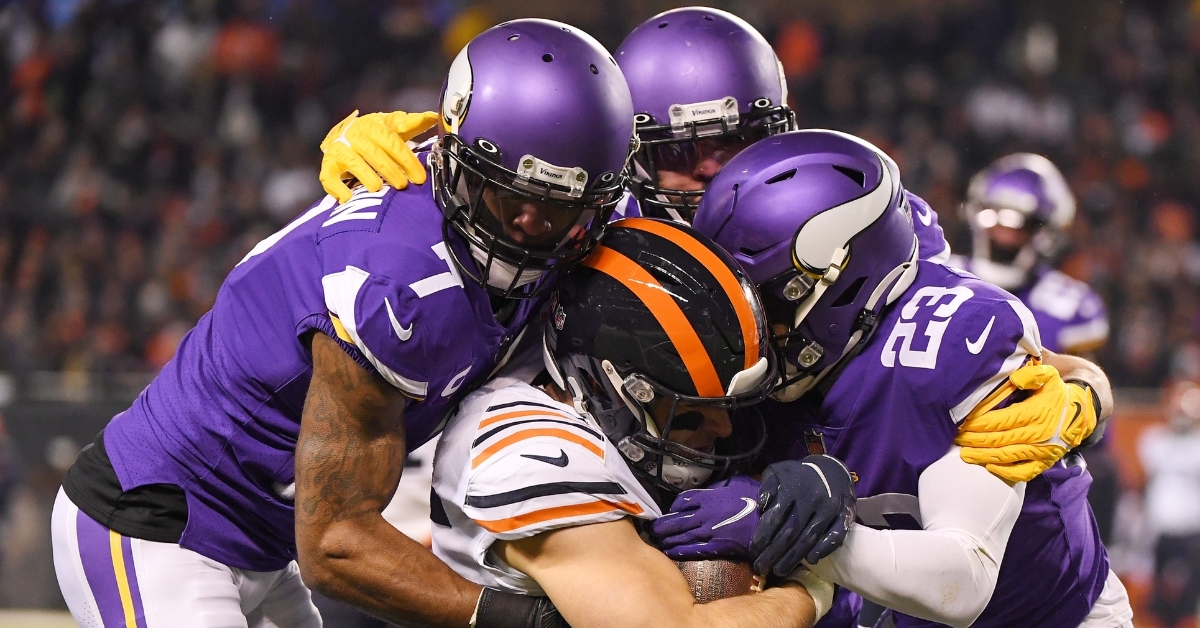 Kmet gang-tackled by the Vikings (Quinn Harris - USA Today Sports)