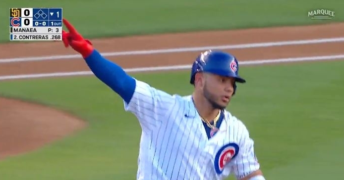 Contreras celebrates rounding the bases 