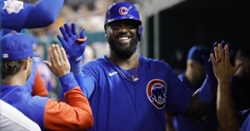 Cubs hold off Nationals in extras