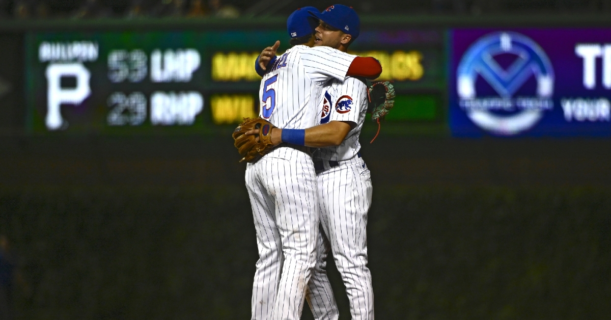 Hoerner and Morel embrace after the win (Matt Marton - USA Today Sports)